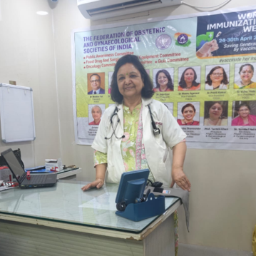 Senior gynecologist standing in a hospital consultation room during the FOGSI World Immunization Week 2026 campaign, promoting vaccination awareness and preventive women's healthcare.