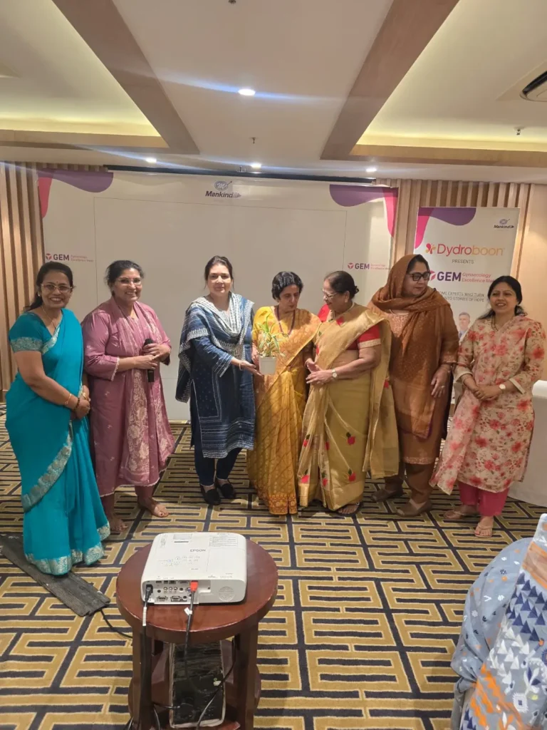 Group of women participating in a healthcare awareness and recognition event at Nishat Hospital during a community engagement program.
